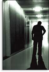 Psychiatrist walking down empy hall