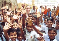 Scientology Volunteer Minister Alissa Sears with children in Sri Lanka