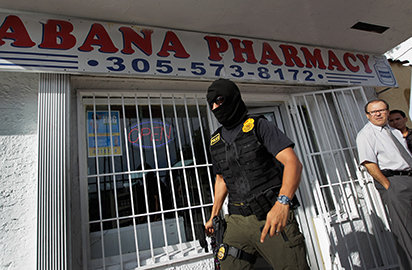 pharmacy, whose owner and employees were arrested in 2011 for selling painkillers without a prescription
