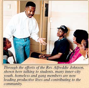 Rev. Alfreddie Johnson with kids