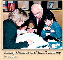 Johnny Grant sees H.E.L.P. tutoring in action.