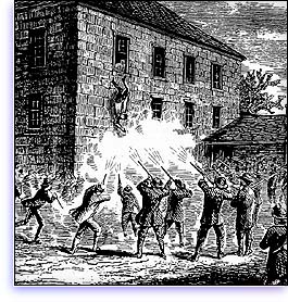 Men firing at a building