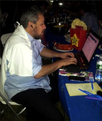 Tony Ortega at Internet cafe